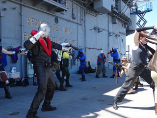Illustration for article titled Seriously Amazing (and Funny) G.I. Joe Cosplay on a Real Aircraft Carrier